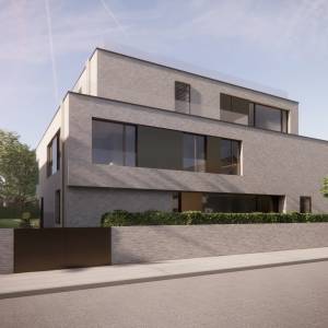 Straßenansicht eines modernen Wohnhauses mit heller Fassade